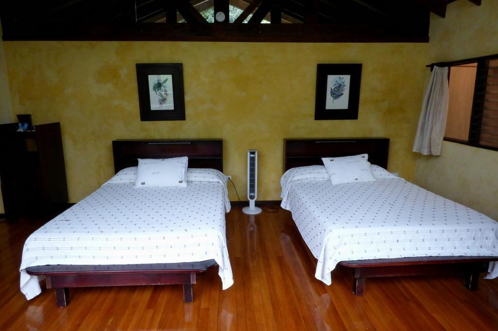 ביחגואה Tenorio Lodge חדר תמונה